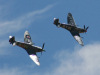 Spitfire Mk.XVIe(TB863) and Mk.VIIIc(MV239) at Temora Aviation Museum Flying Days on 24th October 2009 - photo by Jim Smith.